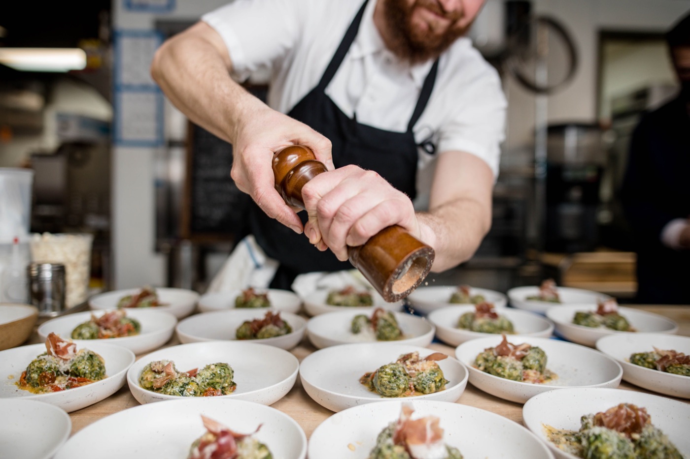 Chef preparing food in a professional kitchen